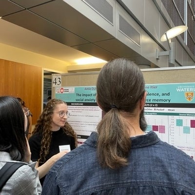 Amie Durston presenting her poster titled "The impact of contextual self-relevance, valence, and social anxiety on face recognition and source memory"