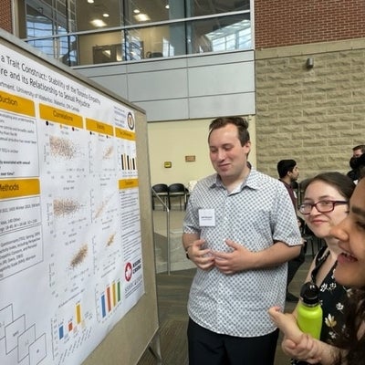 Seth Winward presenting his poster titled "Empathy as a train Construct: Stability of the Toronto Empathy Questionnaire and its Relationship to Sexual Prejudice"