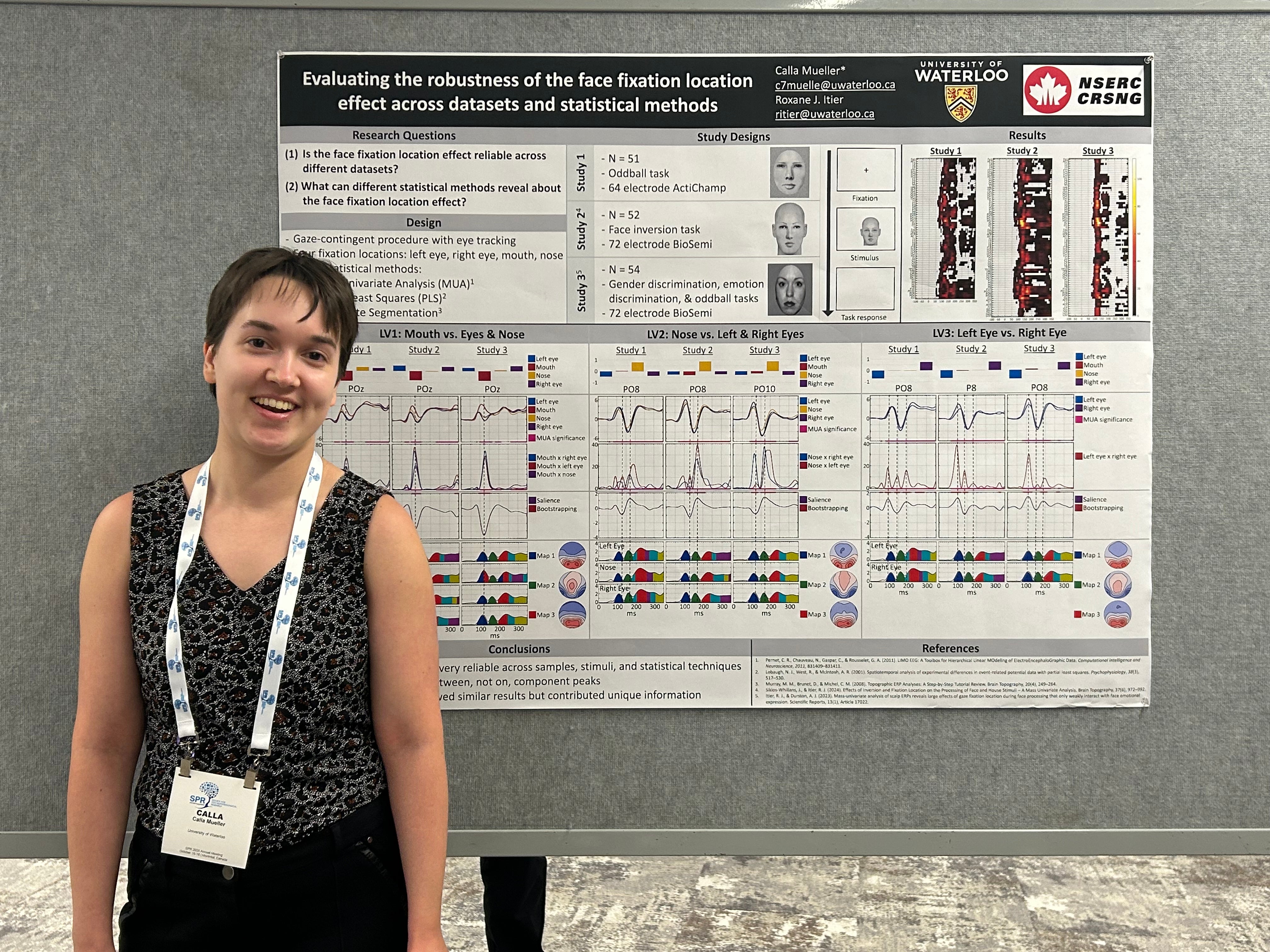 Calla standing at her poster