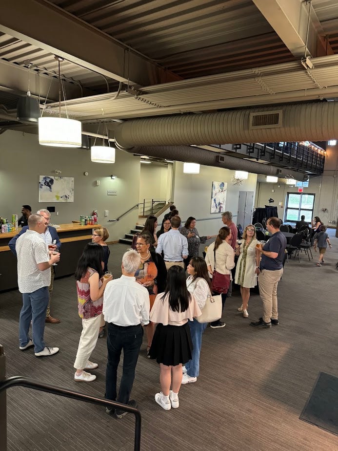 group of  people mingling