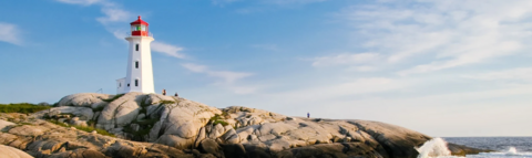 A lighthouse on a rocky outcrop