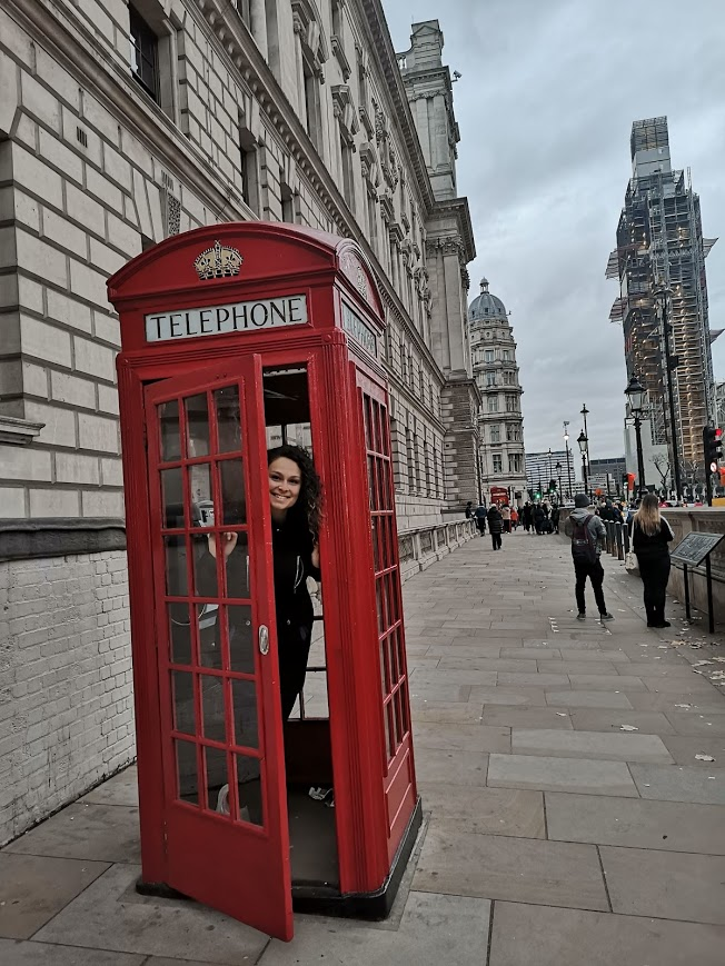 Student in London phone booth