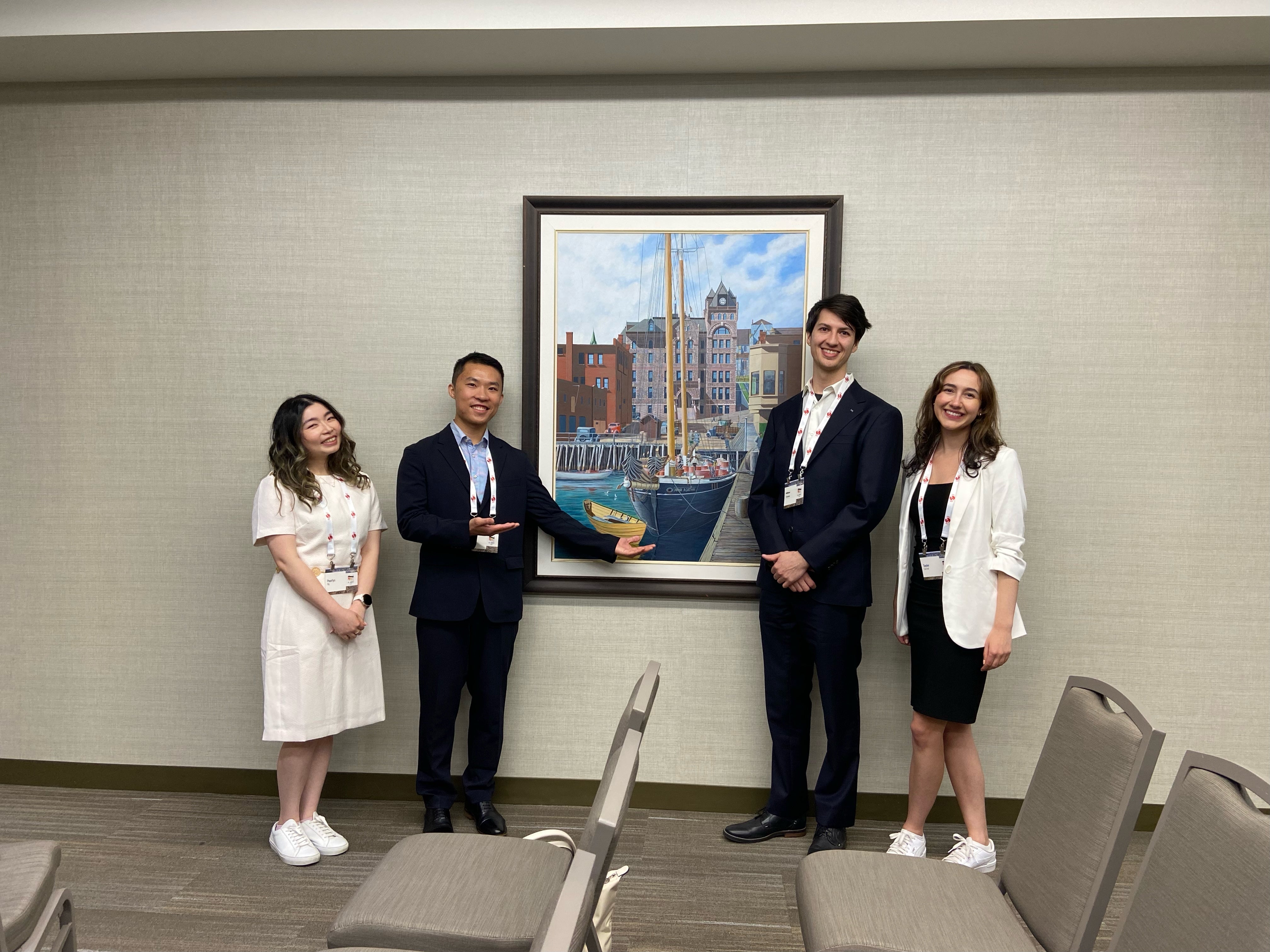 Grad students stand together at CPA conference