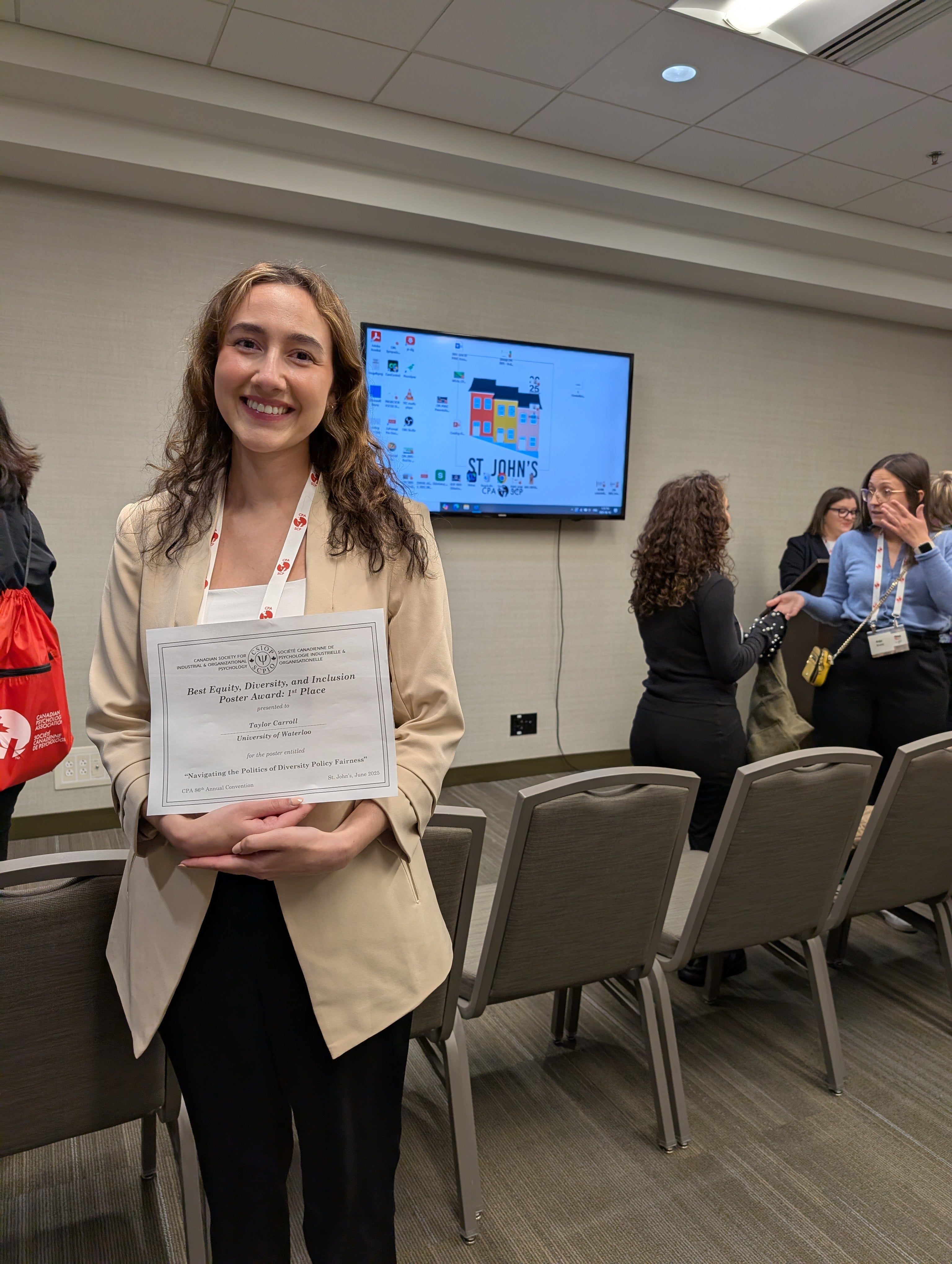 Taylor Carroll with Best EDI Poster Award