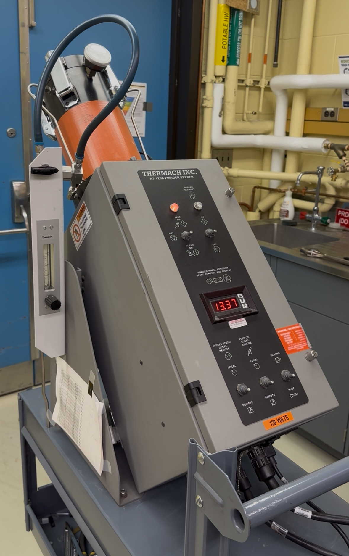 Powder feeder used in FATSLab cold spray system.