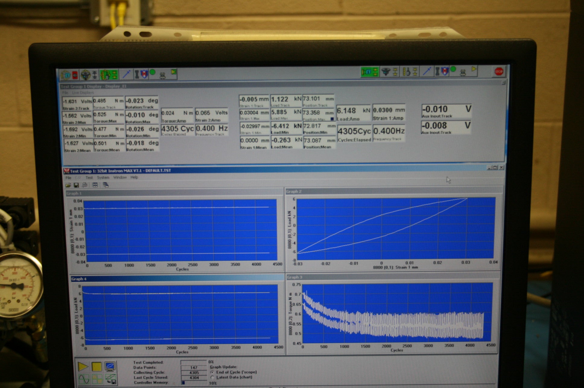 computer screen of instron showing a test running