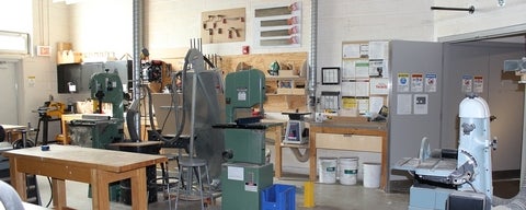 View of a woodworking shop with various tools. 