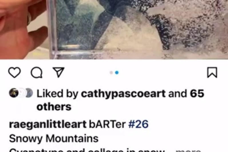 Screencapture of instagram feed showing a snowglobe-like artwork with mountains and clouds in shades of blue