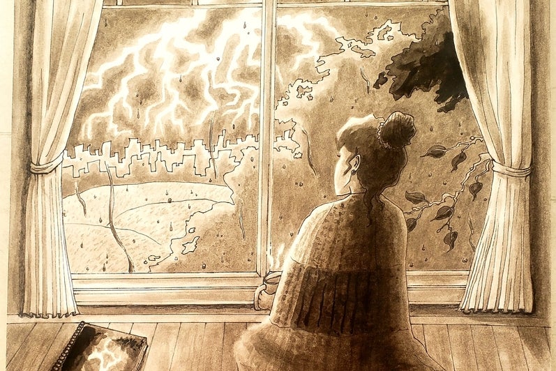 Person sits by a window watching lightning with a painting of lightning beside them.