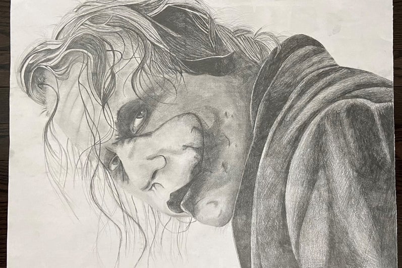 Black and white portrait drawing of the Joker