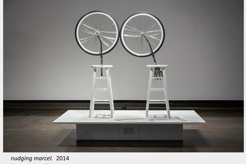 Artwork by Lois Andison.  nudging marcel.  2014, Bicycle wheels and forks, vintage stools, lacquered wood, metal, acrylic, motor