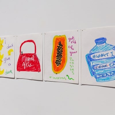 Detail showing 5 colourful drawings of everyday objects including rubber duckies, a purse, a water bottle all with added text.