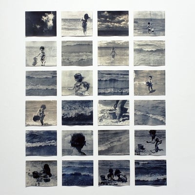 Series of 24 photos of clouds, waves and children playing in the sand, all printed in blue and sepia.