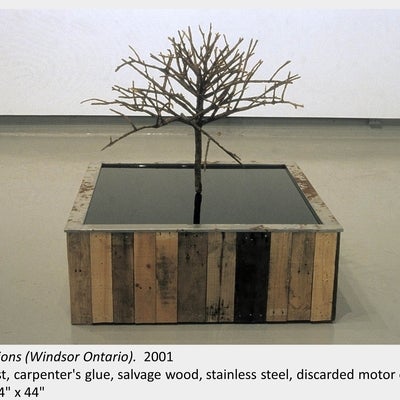 Artwork by Michael Ambedian. Reflections (Windsor Ontario). 2001. Sawdust, carpenter's glue, discarded motor oil.