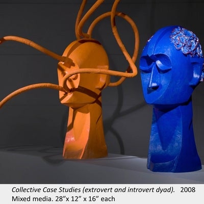 Artwork by Susan Beniston. Collective Case Studies (extrovert and introvert dyad). 2008. Mixed media. 28”x 12” x 16” each.