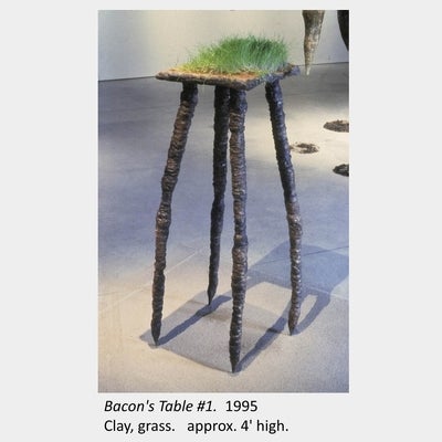 Artwork by Carol Bradley. Bacon's Table #1. 1995. Clay, grass. approx. 4' high.