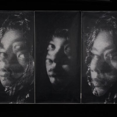Three long rectangular black and white photographs depicting multiple exposures of a face in three-quarter view.