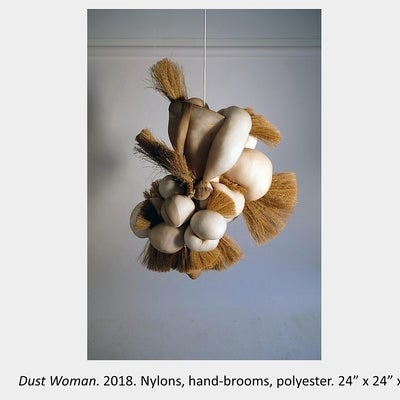 Artwork by Maria Sinmmons - Dust Woman. 2018. Nylons, hand-brooms, polyester. 24” x 24” x 24”