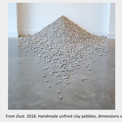 Artwork by Sara Pearson - From Dust. 2018. Handmade unfired clay pebbles, dimensions variable