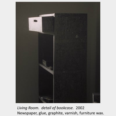 Artwork by In-Sun Kim. Living Room. detail of bookcase. 2002. Newspaper, glue, graphite, varnish, furniture wax.