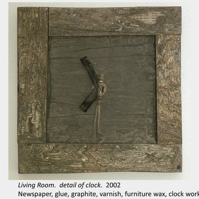 Artwork by In-Sun Kim. Living Room. detail of clock. 2002. Newspaper, glue, graphite, varnish, furniture wax, clock works.