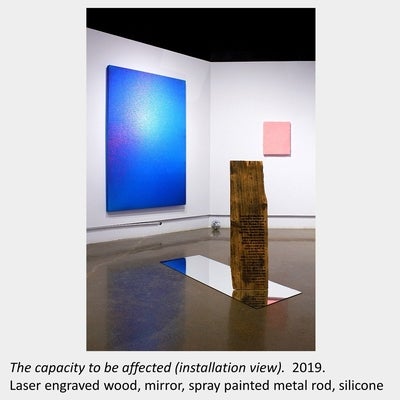 Tyler Matheson's artwork "The capacity to be affected" 2019, laser engraved wood, mirror, spray painted metal rod, silicone