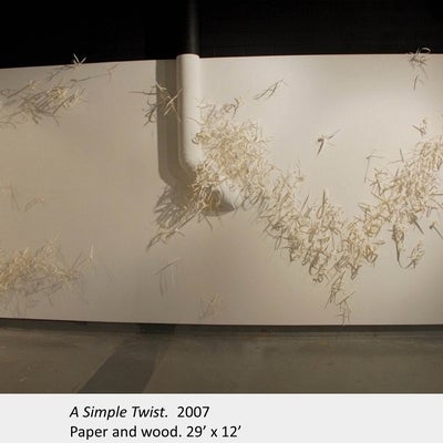 Artwork by Dawn Stafrace. A Simple Twist. 2007. Paper and wood. 29’ x 12’