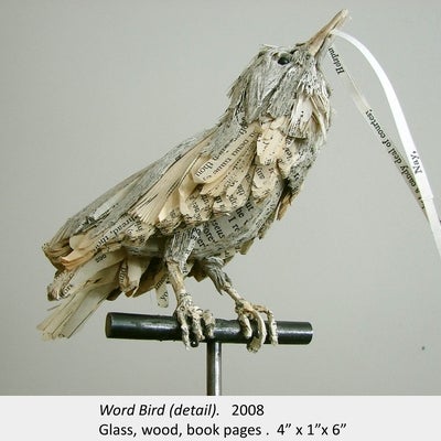 Artwork by Amy Switzer. Word Bird (detail). 2008. Glass, wood, book pages. 4” x 1”x 6”