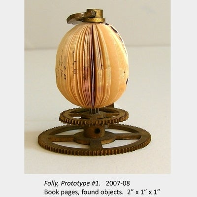 Artwork by Amy Switzer. Folly, Prototype #1. 2007-08. Book pages, found objects. 2” x 1” x 1”