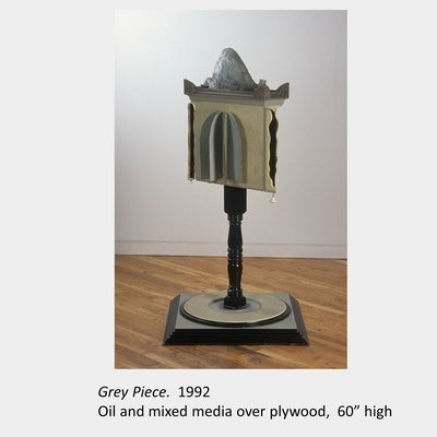 Artwork by Tony Urquhart. Grey Piece. 1992. Oil and mixed media over plywood. 60” high