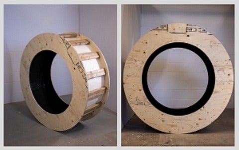 Two views of a large ring-shaped plywood sculpture, similar to a waterwheel.