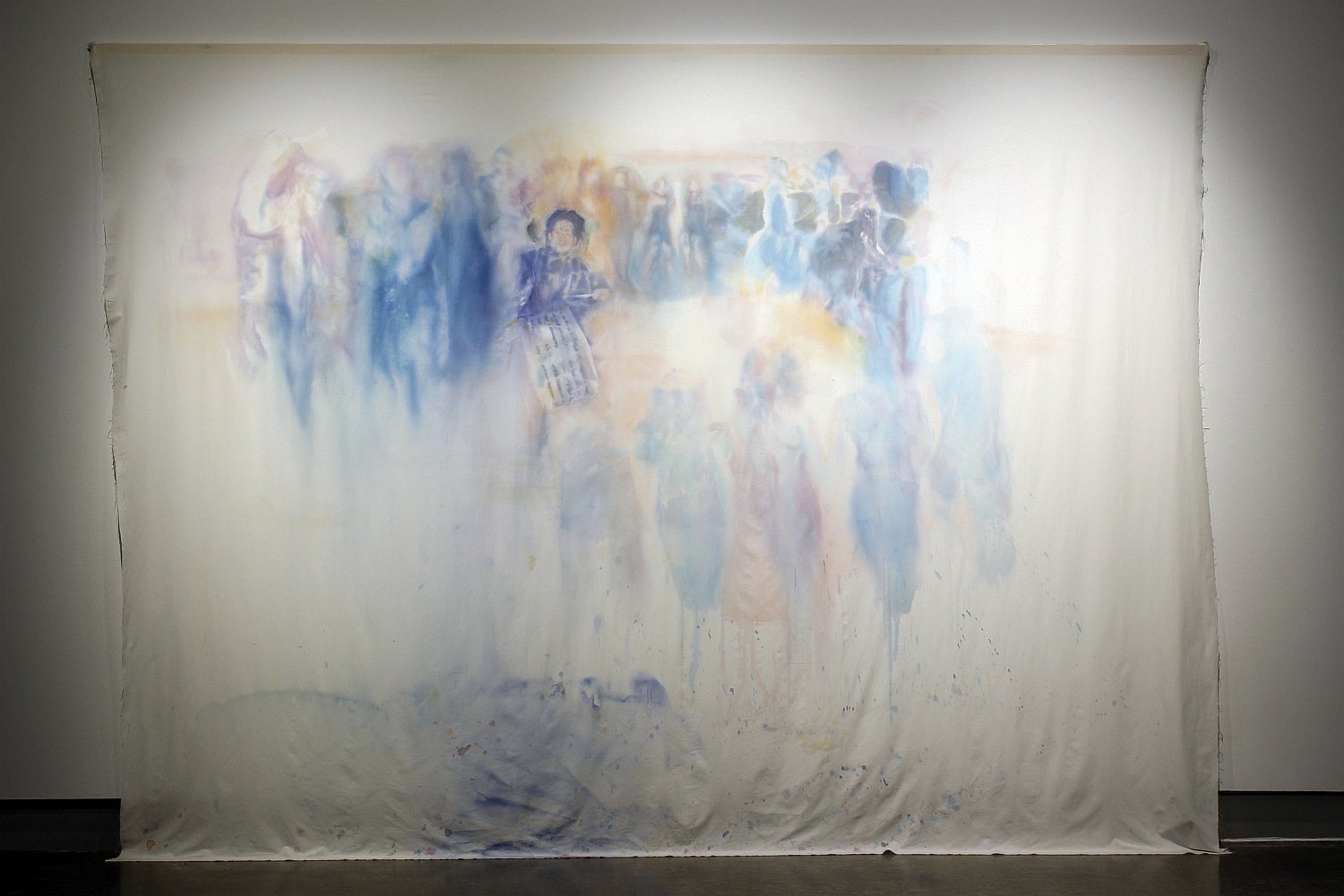  An ink wash painting on a large sheet of canvas showing a member of the artist’s family dancing a traditional dance.