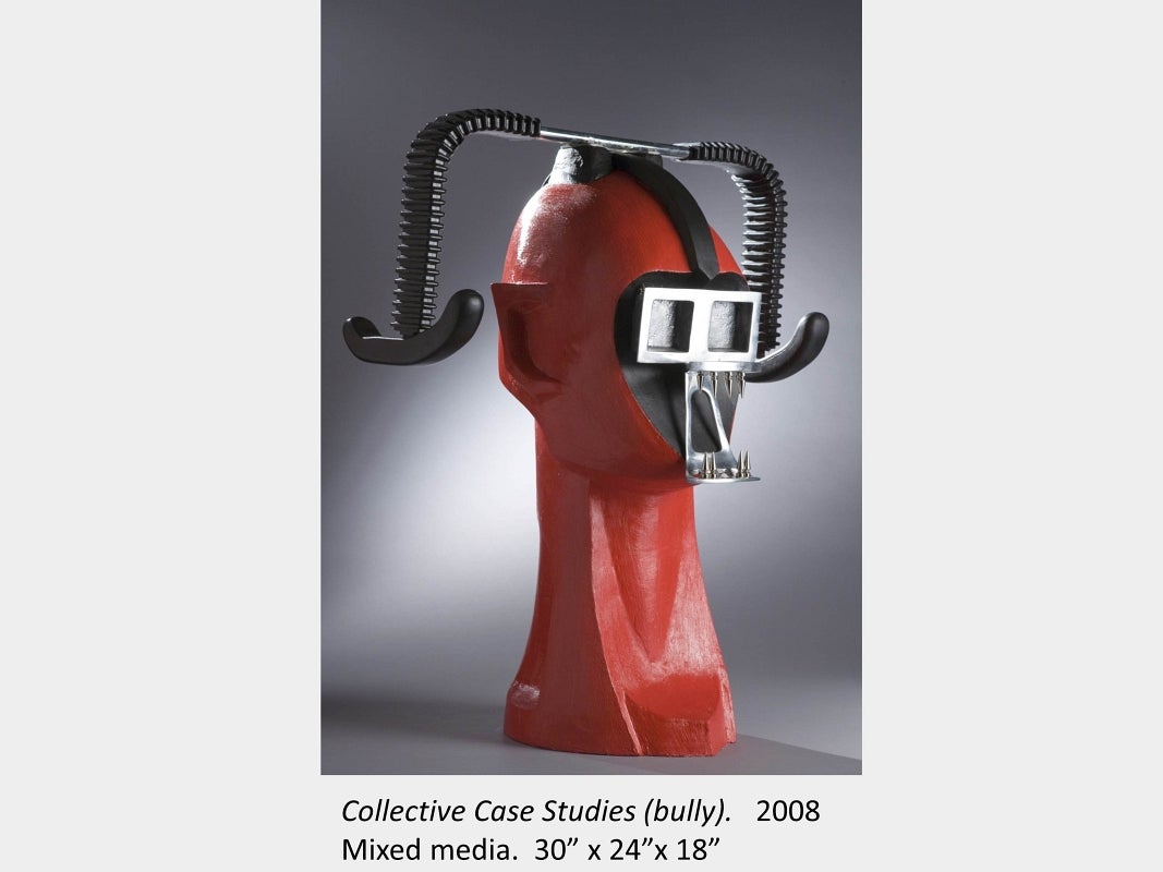 Artwork by Susan Beniston. Collective Case Studies (bully). 2008. Mixed media.  30” x 24”x 18”