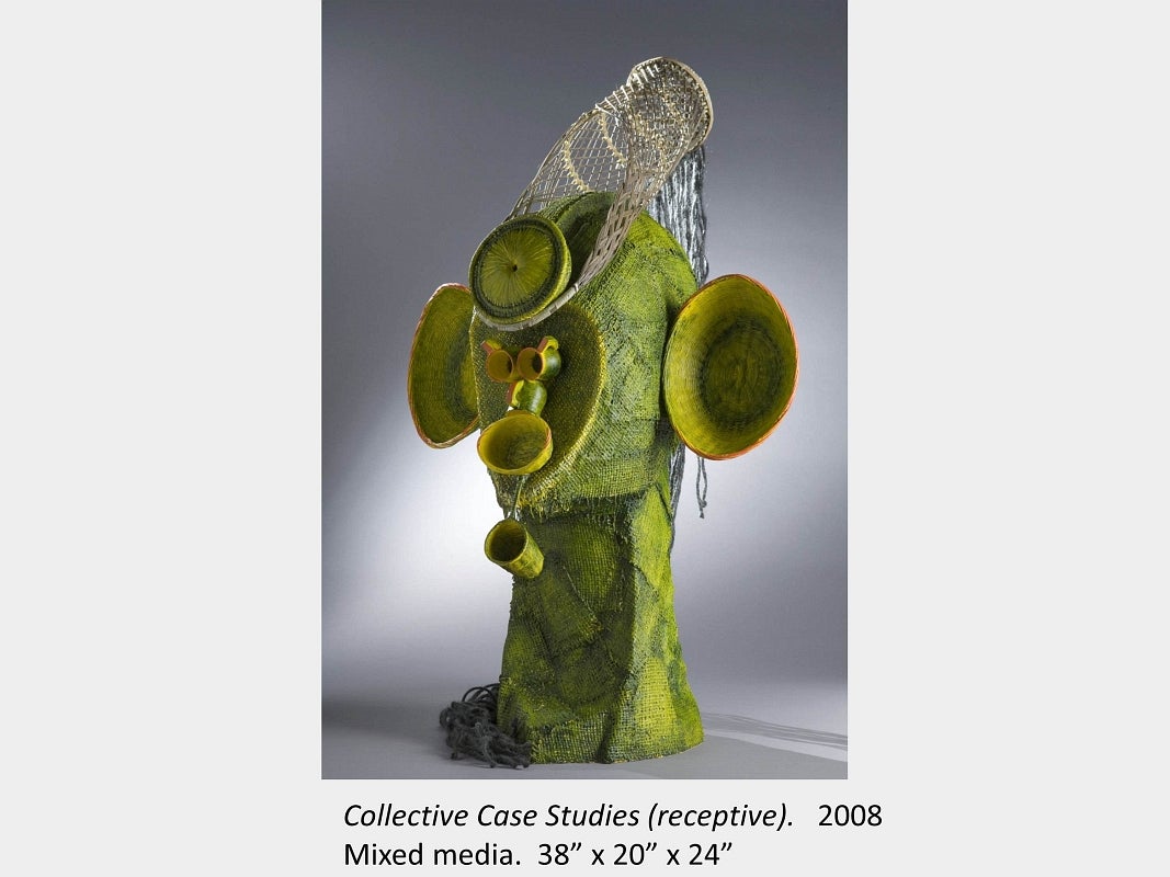 Artwork by Susan Beniston. Collective Case Studies (receptive). 2008. Mixed media.  38” x 20” x 24”