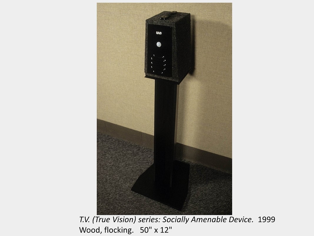 Artwork by Mathew Blakely. T.V. (True Vision) series: Socially Amenable Device. 1999. Wood, flocking. 50" x 12"