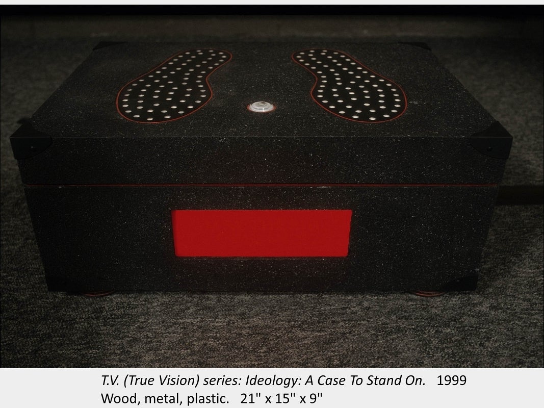 Artwork by Mathew Blakely. T.V. (True Vision) series: Ideology: A Case To Stand On. 1999. Wood, metal, plastic. 21" x 15" x 9"