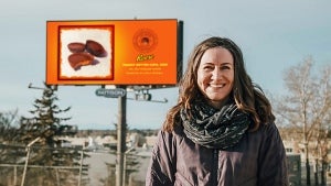 Emily Bickell and her Reese Peanut Butter Cup billboard