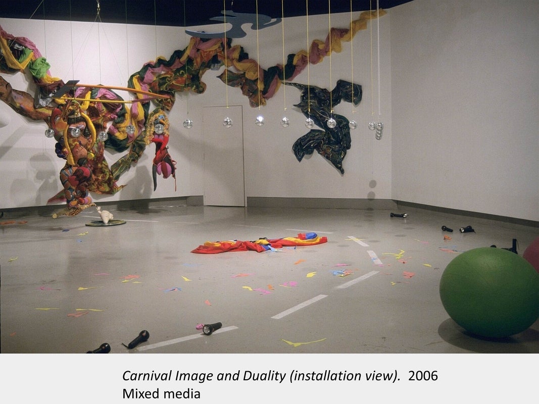 Artwork by Cesar Forero. Carnival Image and Duality (installation view). 2006. Mixed media.