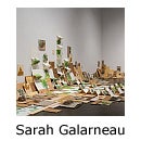 Art installation on gallery floor and text reading "Sarah Galarneau"