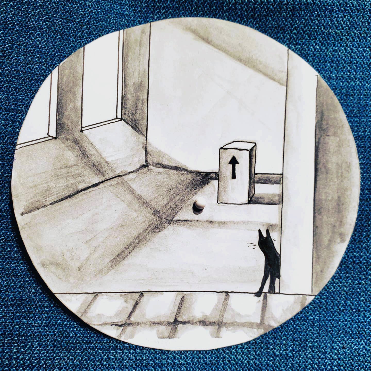 Black and white drawing of a room with a small black cat in the doorway looks behind at a box with a large arrow pointing upward
