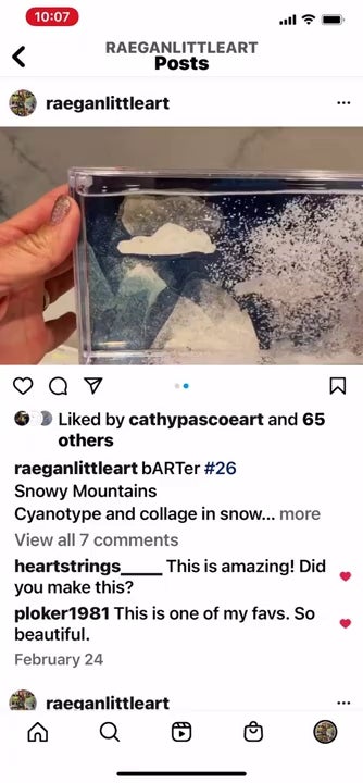 Screencapture of instagram feed showing a snowglobe-like artwork with mountains and clouds in shades of blue