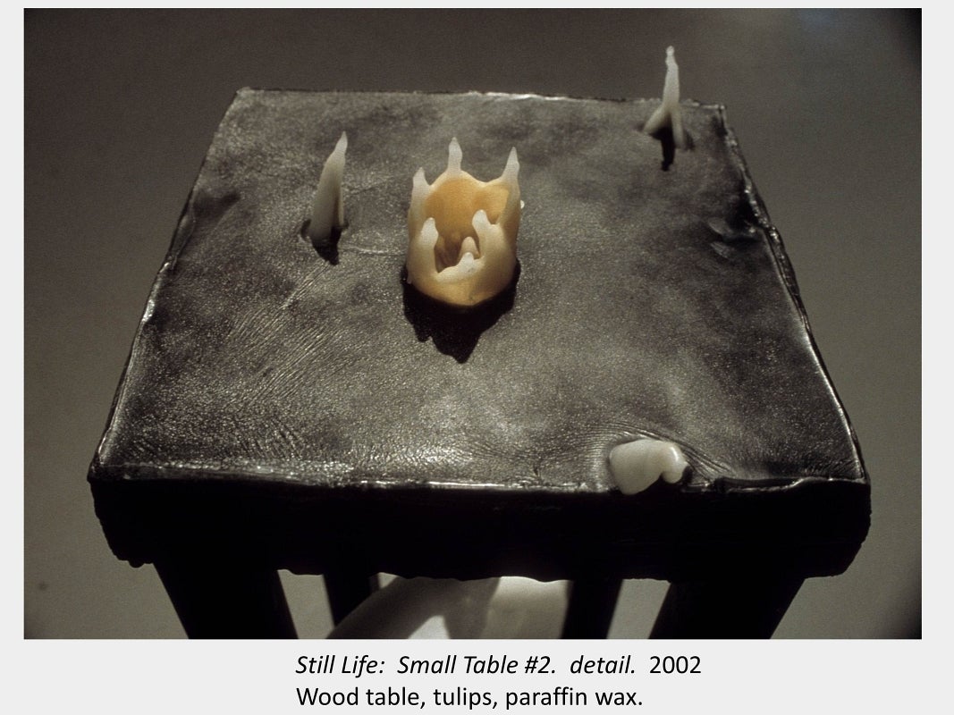 Artwork by Tamara Izsak. Still Life: Small Table #2. detail. 2002. Wood table, tulips, paraffin wax.