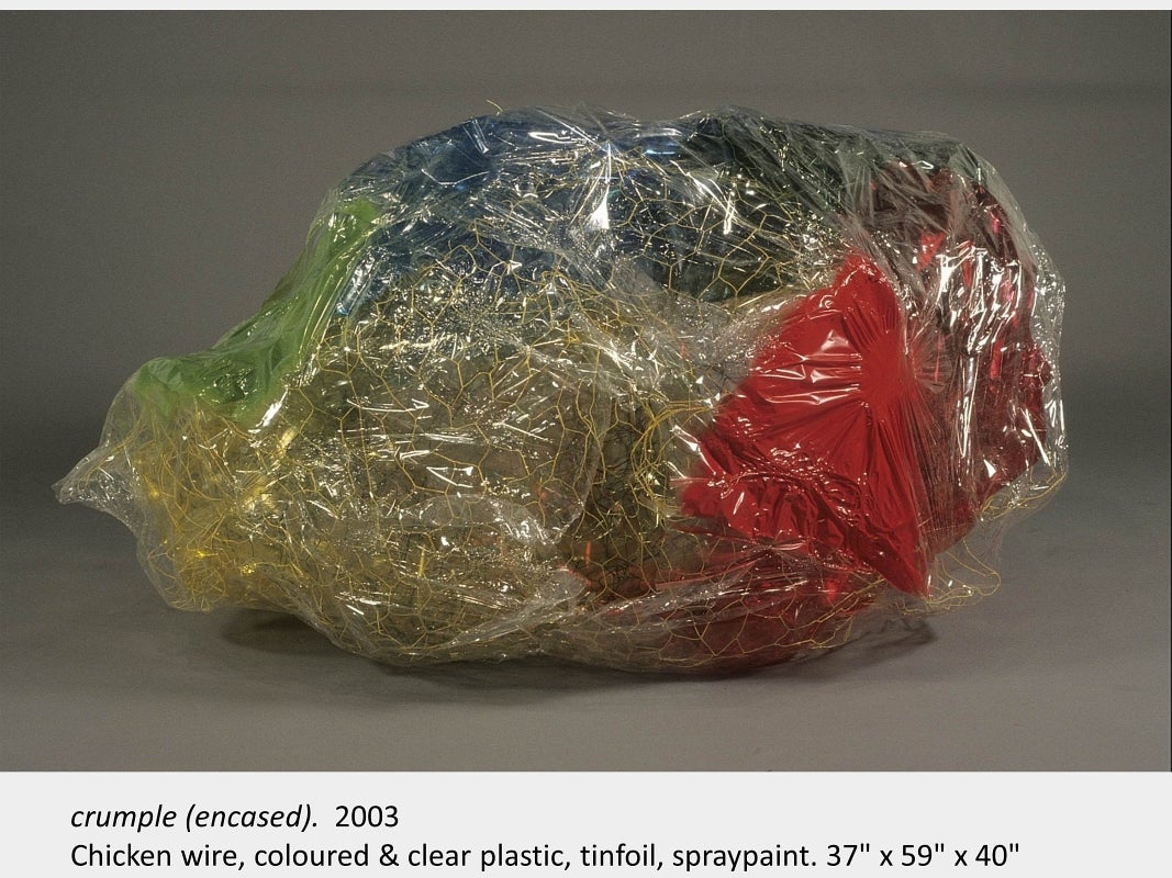 Artwork by Michael Murphy. crumple (encased).  2003. Chicken wire, coloured & clear plastic, tinfoil, spraypaint. 37" x 59" x 40