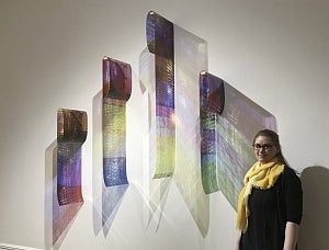 Natalie Hunter with her artwork