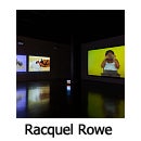 Text "Racquel Rowe" of video exhibition in a darkened gallery