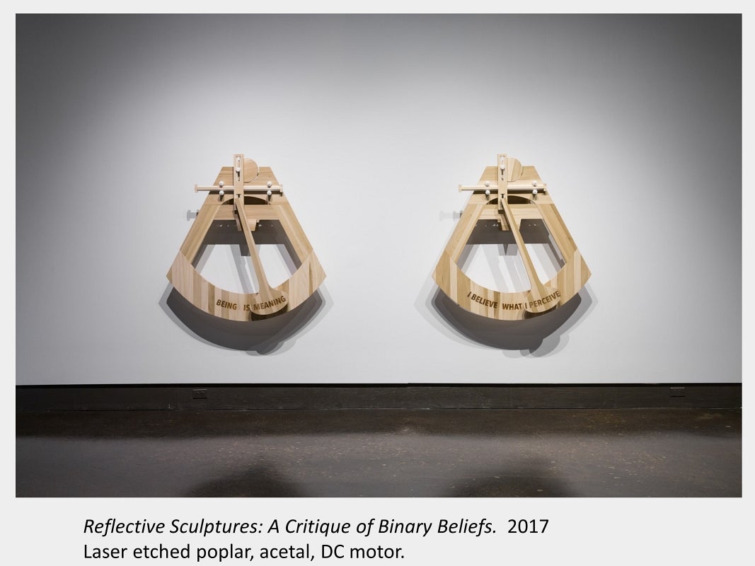 Artwork by Denise St Marie and Timothy Walker, Reflective Sculptures: A Critique of Binary Beliefs, 2017, Laser etched poplar