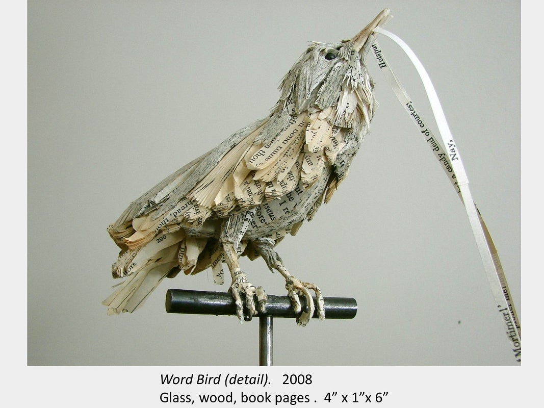 Artwork by Amy Switzer. Word Bird (detail). 2008. Glass, wood, book pages. 4” x 1”x 6”