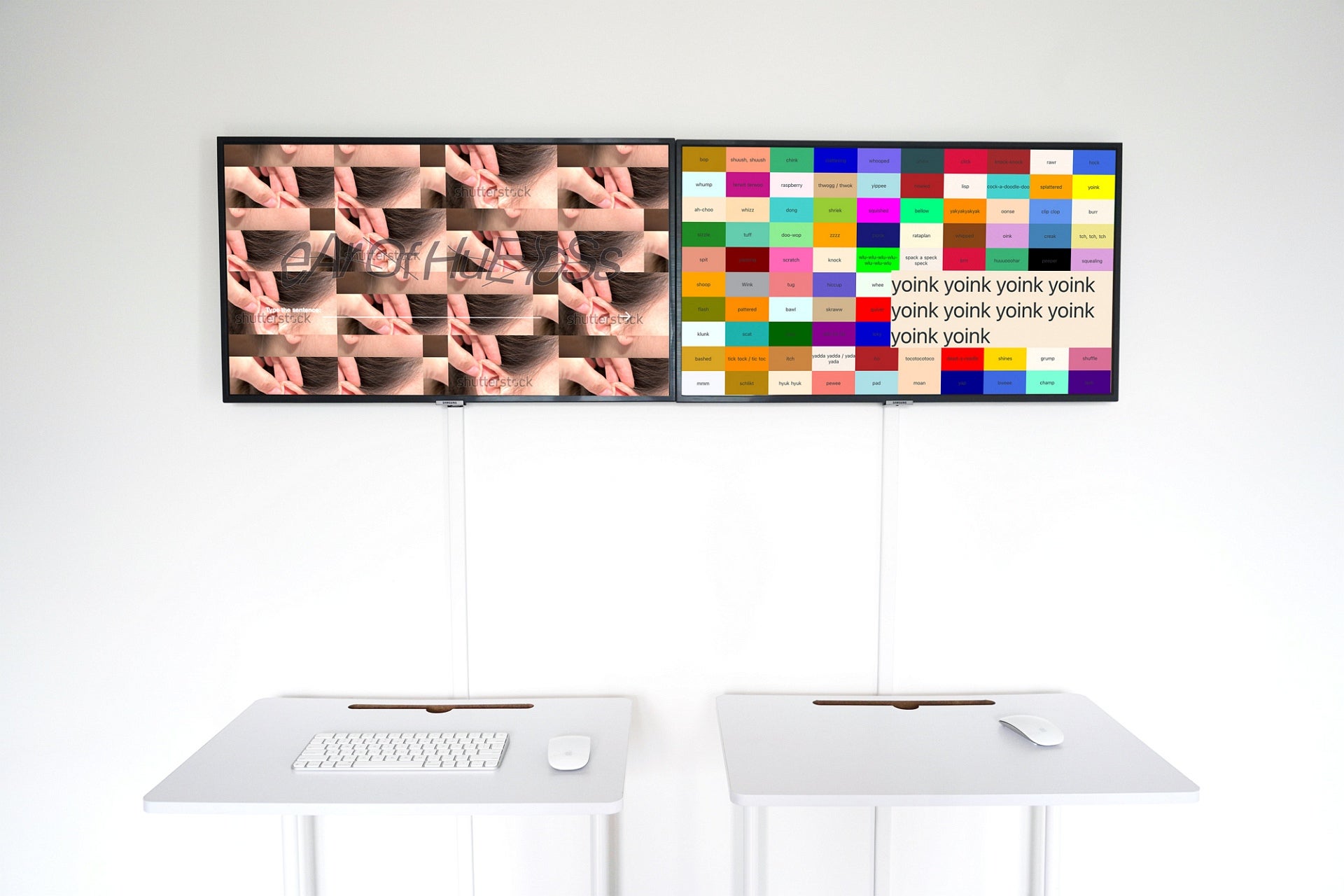 Artwork of two monitors on a wall above two white tables with keyboard and mouse. The monitor on the left displays a grid of multiple images of an ear being pulled up into a point.  The monitor on the right displays a grid of multicoloured square with a word in each square.  A larger word, "yoink", repeats on top of this grid.