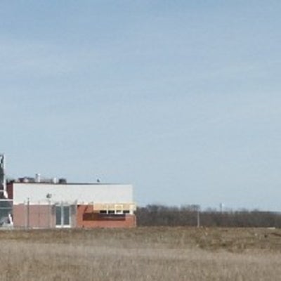 Live Fire Research Facility building on left and multi-storied Fire Training Structure on the right.