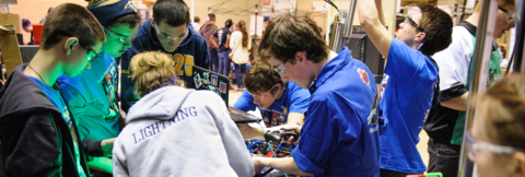 Robotics team working on their project 